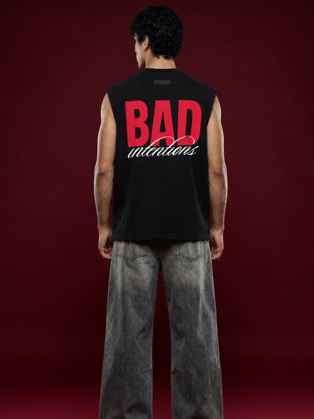 UNCUT’S Oversized Arm-cut T-shirt