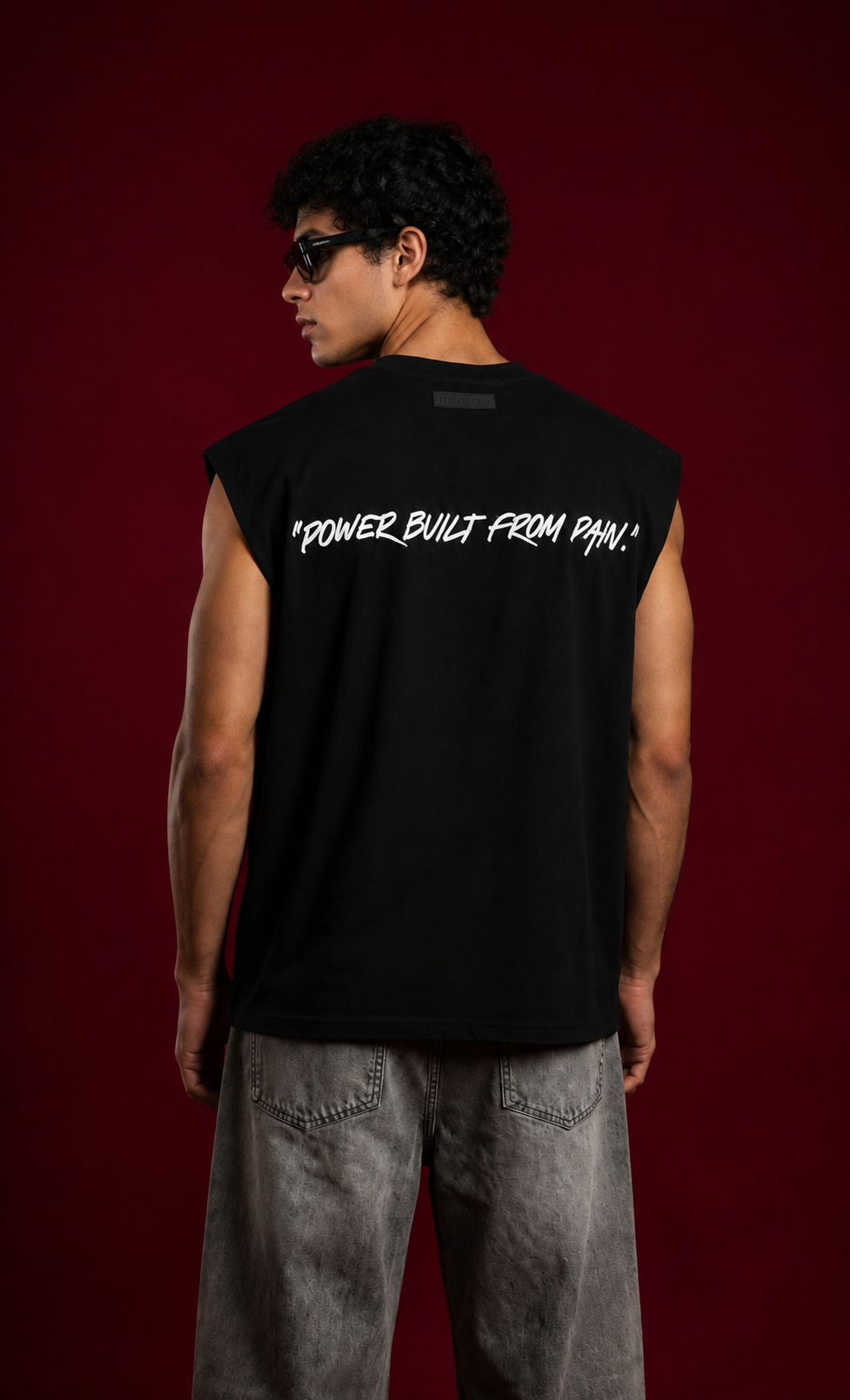 UNCUT’S Oversized Arm- cut T-shirt