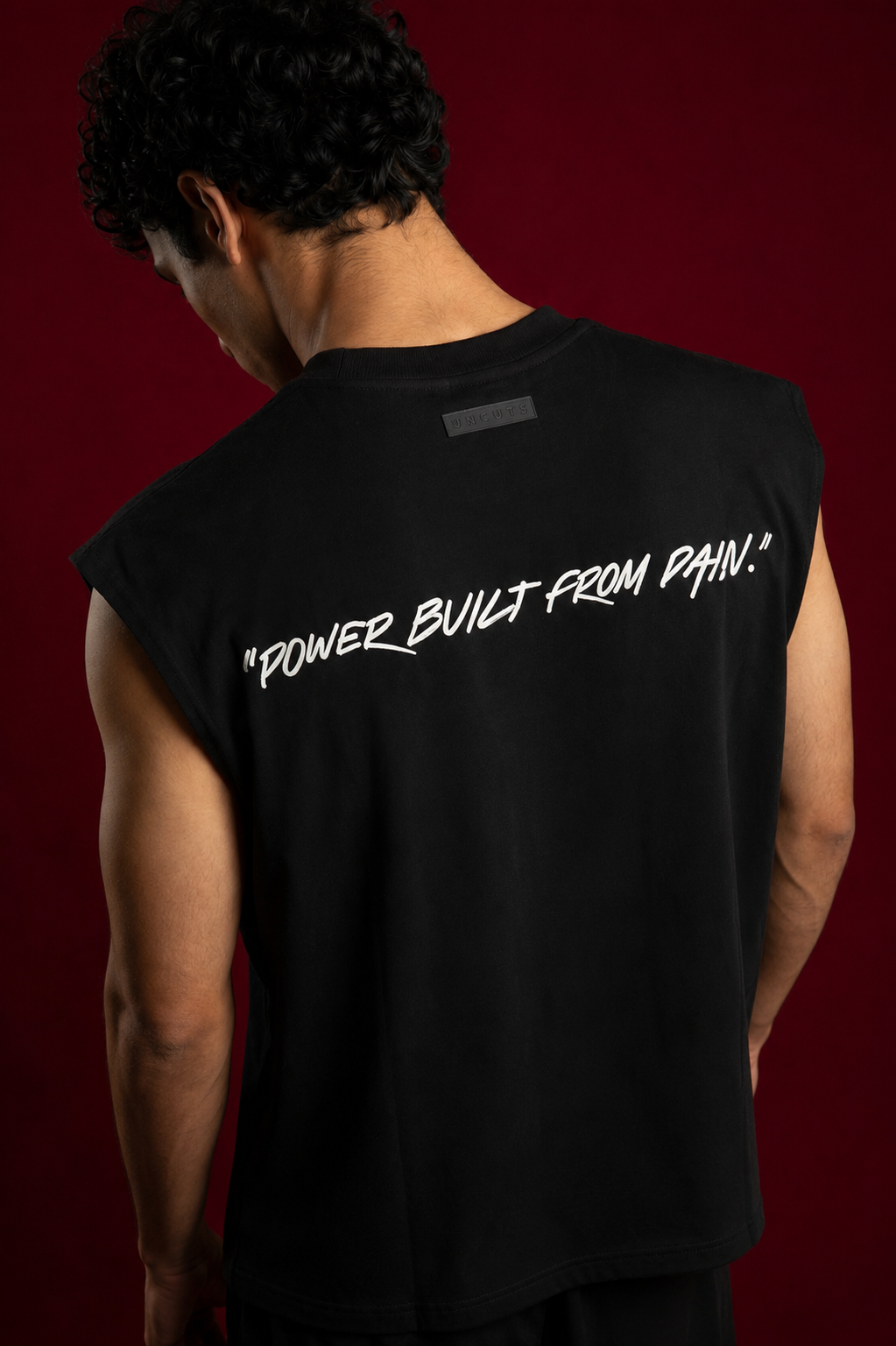 UNCUT’S Oversized Arm- cut T-shirt