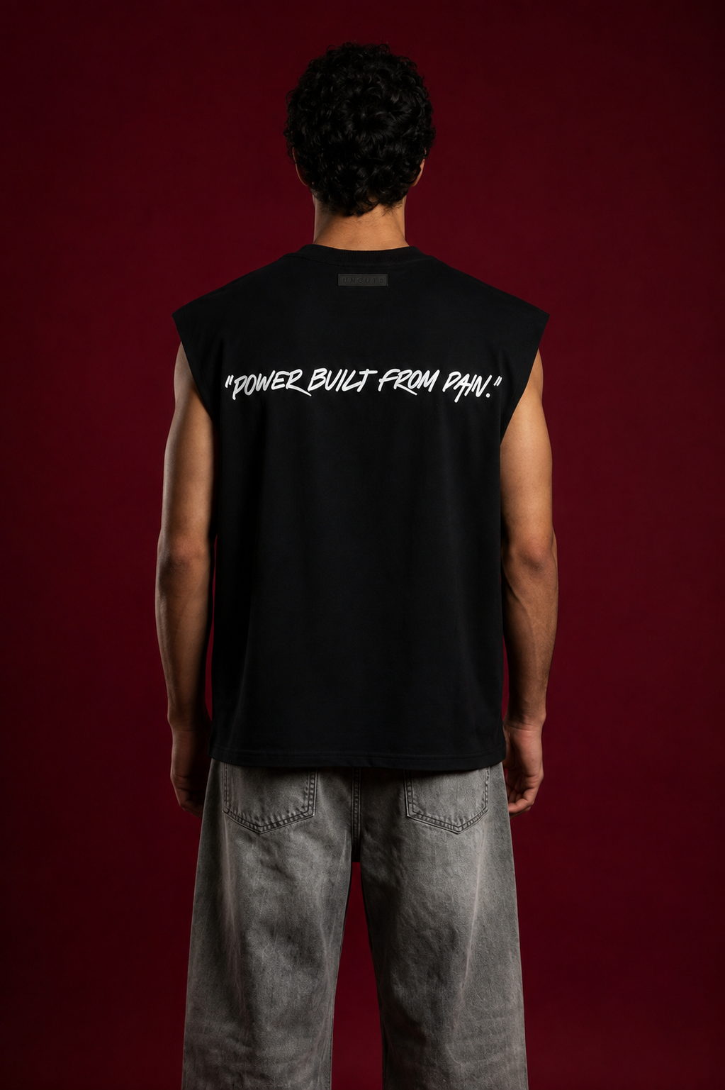 UNCUT’S Oversized Arm- cut T-shirt
