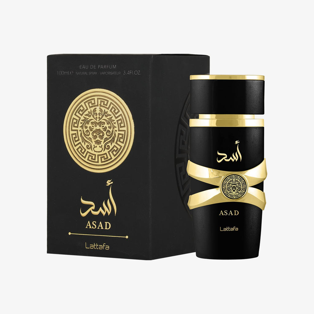 Black and gold perfume bottle and packaging with 'ASAD' branding on a white background